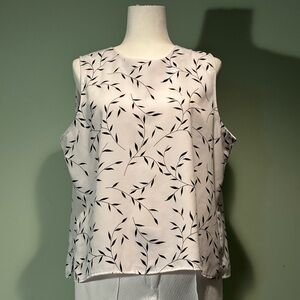 Women’s white polyester sleeveless blouse size XL